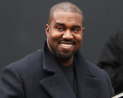 Kanye West in black coat