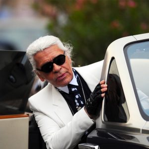 Karl Lagerfeld in white suit