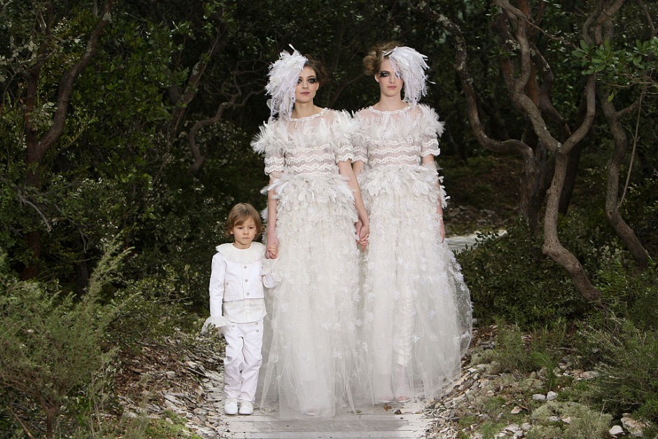 Models walk the runway during the Chanel Spring/Summer 2013 Haute-Couture show in Paris (Photo by Stephane Cardinale/Corbis via Getty Images)